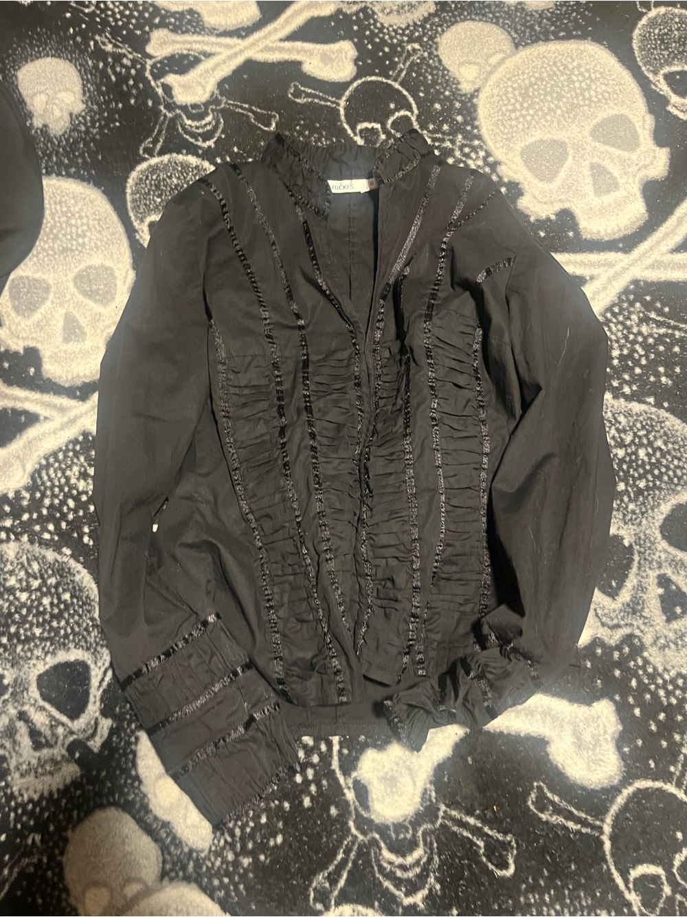 Ricki’s gothic black front clasping top